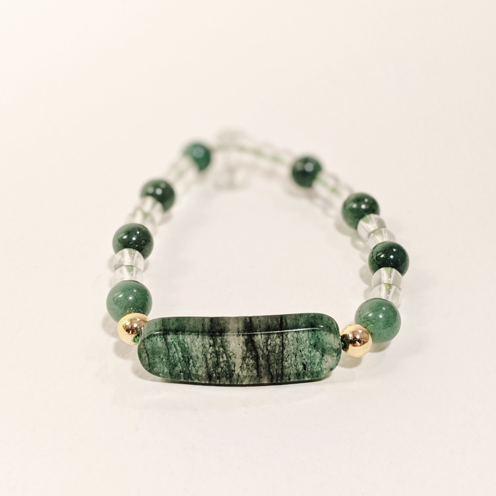Jade and gold bracelet